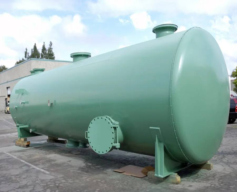 Large green coated horizontal pressure vessel