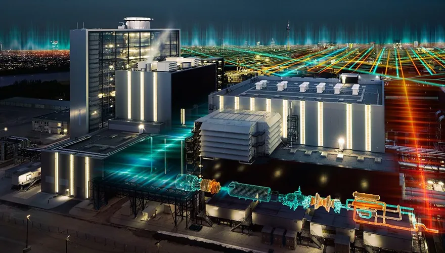 Illuminated power plant facility at dusk